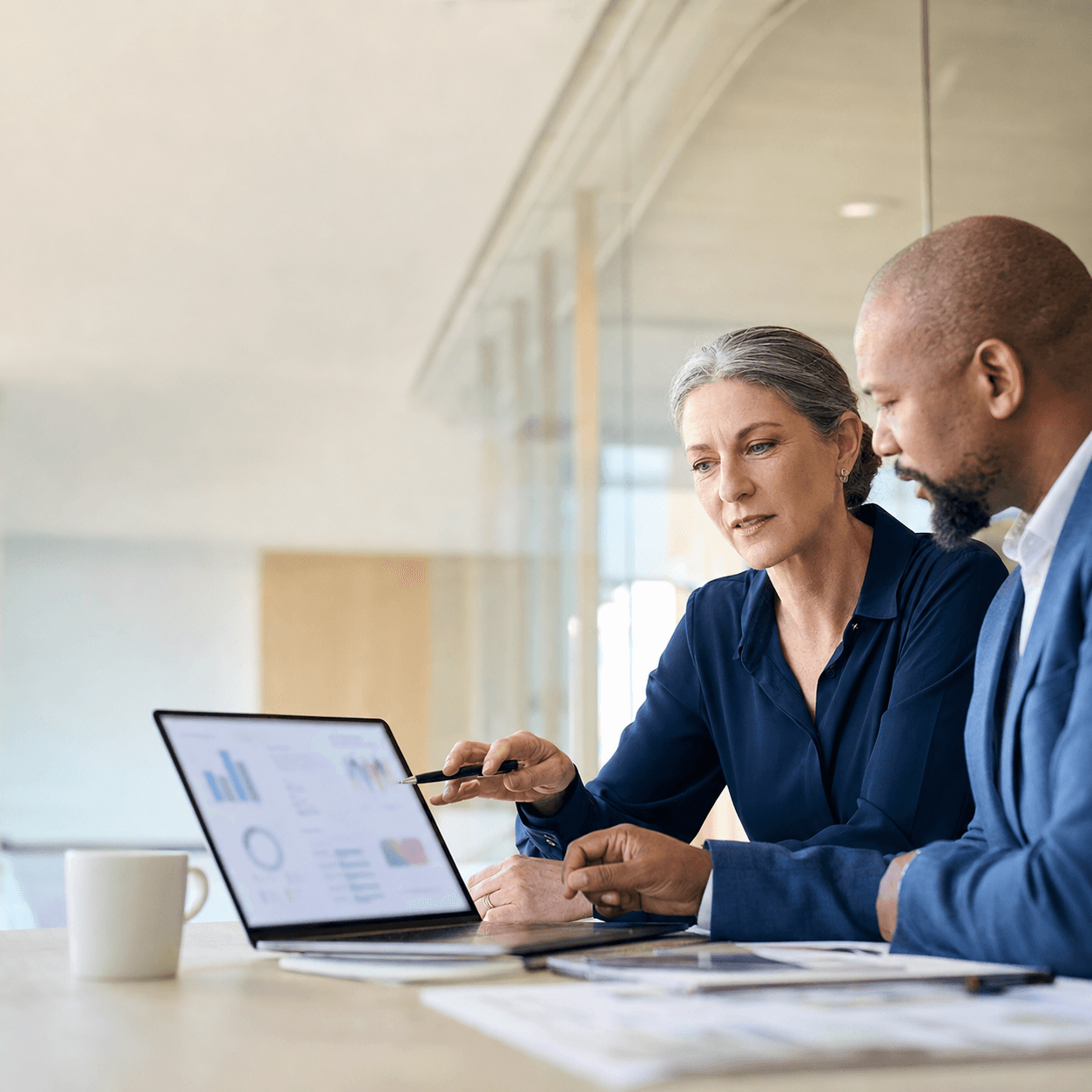 People analytics dashboard review in a modern office
