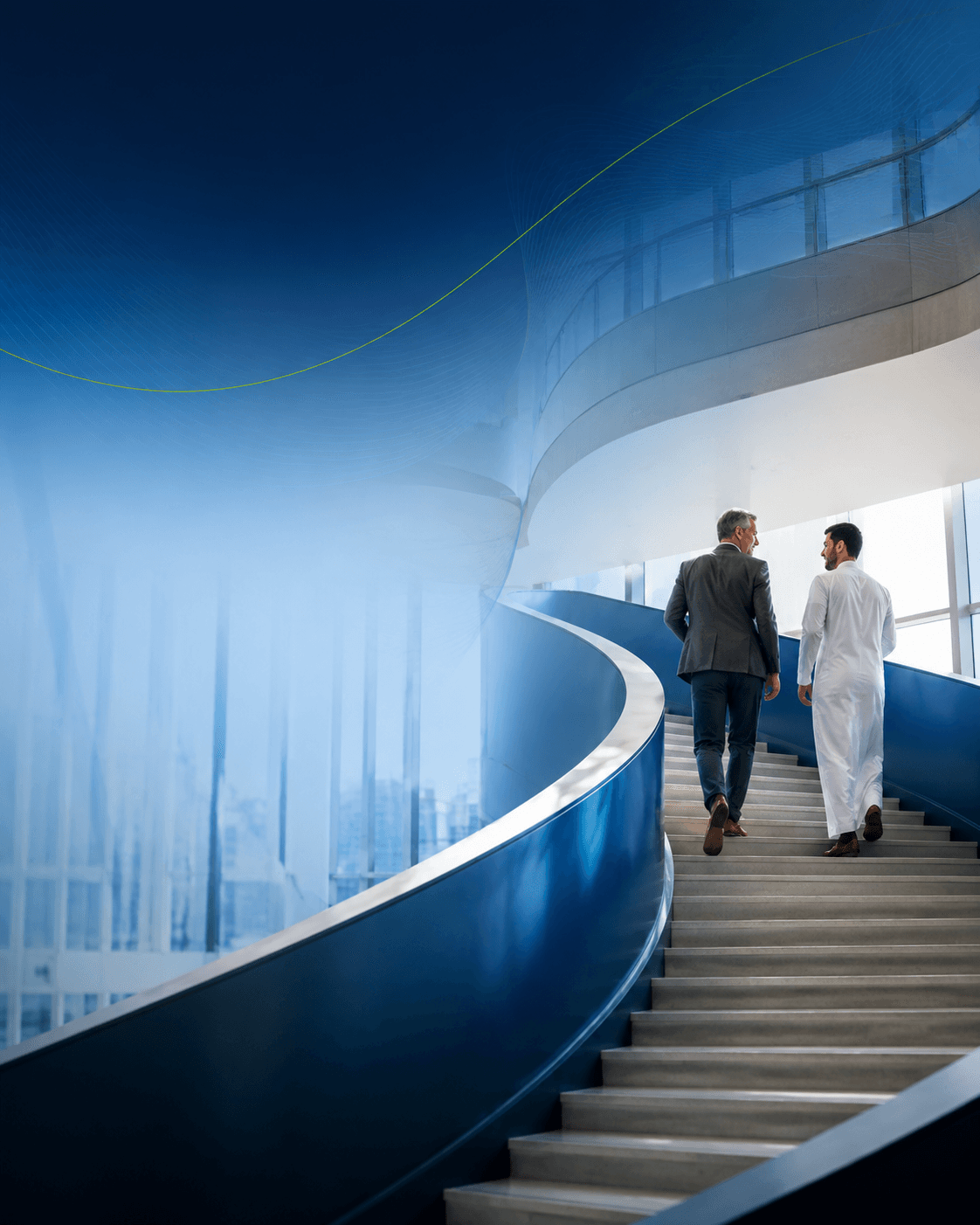 Two colleagues ascending a modern staircase